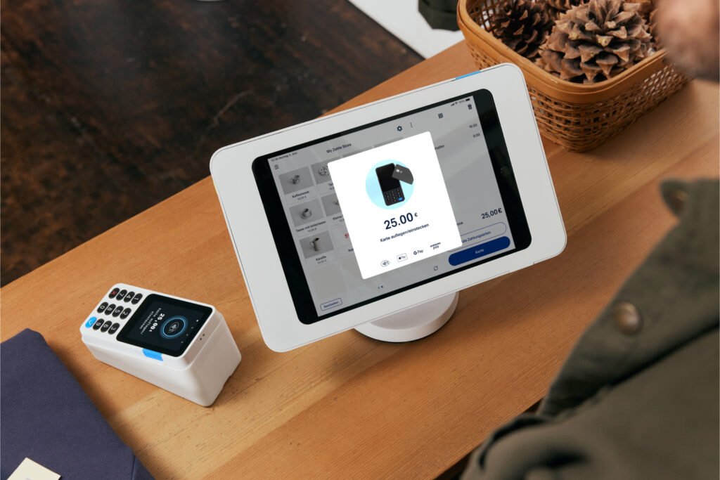 PayPal Reader neben iPad Kasse am Tresen